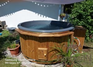 Wood heated hot tub