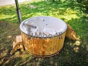 Outdoor fiberglass hot tub with integrated heater Wellness Deluxe 12