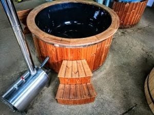 Outdoor hot tub with wood fired external burner black fiberglass thermo wood 11
