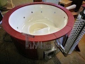 Fiberglass lined outdoor hot tub integrated heater with wood staining in red 26