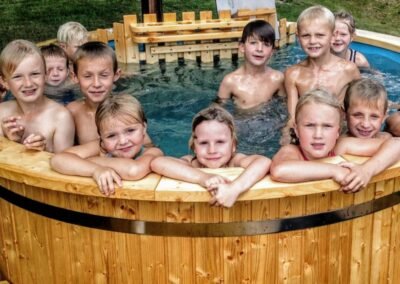 Round wood powered hot tub